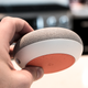 Google compares the shape to a donut, but it feels like a cheeseburger slider to me.